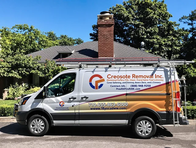 East Los Angeles Chimney Sweep technician removing creosote safely in East Los Angeles, CA