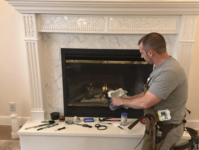 East Los Angeles Chimney Sweep performing fireplace maintenance in East Los Angeles, CA